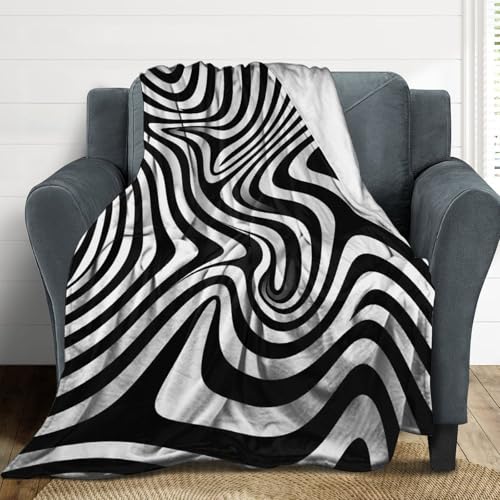 Couverture flanelle Whirlpool Illusion 130x150cm douce pour canapé