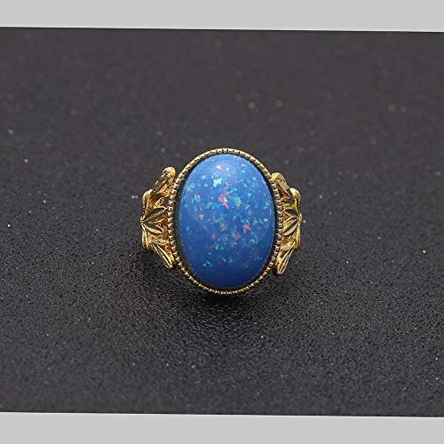 Alberta Birthstone Ring for Women by Ginger Lyne |Large Blue Oval Simulated Opal Engagement Ring for Her | Yellow Gold Plated October Birth Month Gemstone Statement Design4