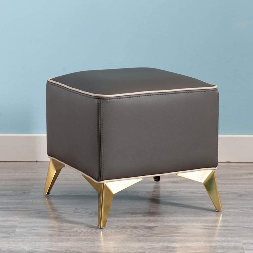 Banco de piel sintética y patas de metal con acabado minimalista para oficina o salón