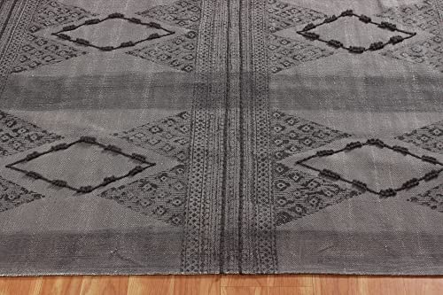 Tapis de sol lavable avec pompons pour simplifier l'entretien