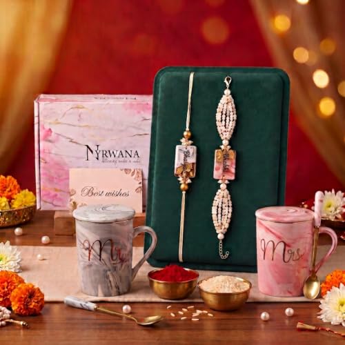 Image of NYRWANA Coffee Mug, Wedding Gift for Couples, Rakhi for Brother and Bhabhi with Gift, Mr & Mrs Set of 2 Coffee Mugs, Lids, Golden Spoon, Bag, Box, Pink Rakhi with Tilak and chawal (380ml-Ceramic)