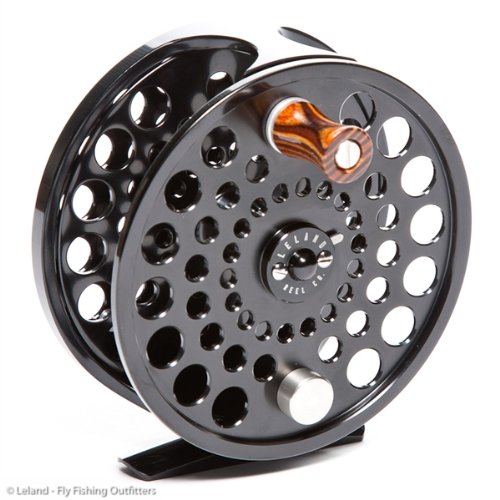 click and pawl fly reel
