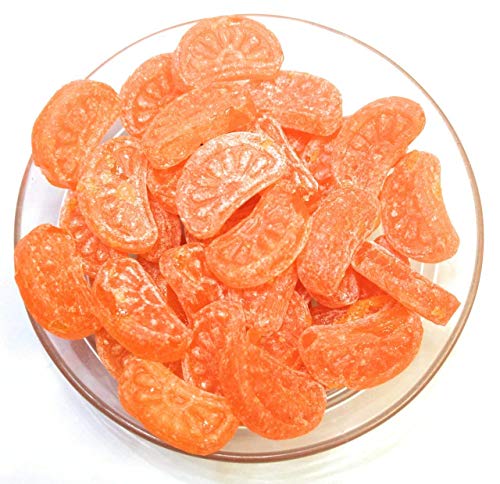 Savourer un bonbon orange QURA Plant N Plate saveur NARANGI après le repas