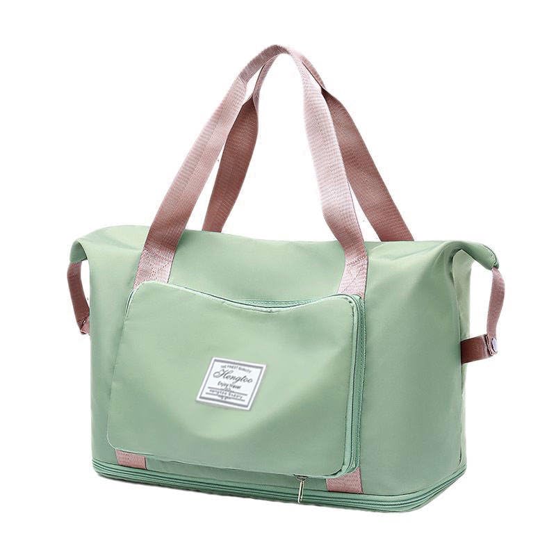 Image of WildHorn Nylon Duffel Bag for Women | Folding Carry-on Expandable Large Capacity DurableLightweight Travel & Gym Duffel with Front Zipper Pocket (Pista Green)