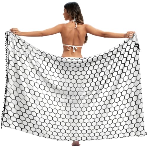 Traje de baño mameluco blanco y negro ideal para tardes de playa casual