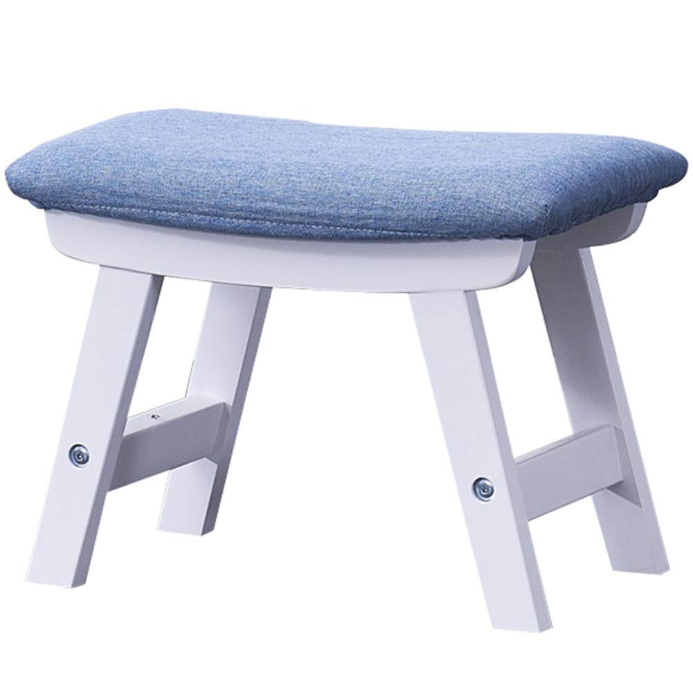 Pouf de rangement en tissu pour optimiser l'espace du salon et ranger vos plaids avec style