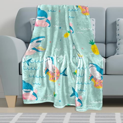 Couverture microfibre licorne pour des soirées cocooning chaleureuses sur le canapé