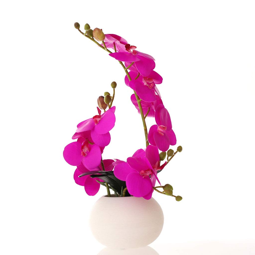 Centros de mesa con flores artificiales azules y orquídea en maceta