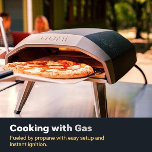 Image of Ooni Koda 12 Gas Pizza Oven & Peel Bundle - 28mbar Propane Outdoor Portable Oven For Fire and Stonebaked 12 Inch Pizzas in 60 Seconds, Includes 12 inch Pizza Peel and Gas Hose & Regulator
