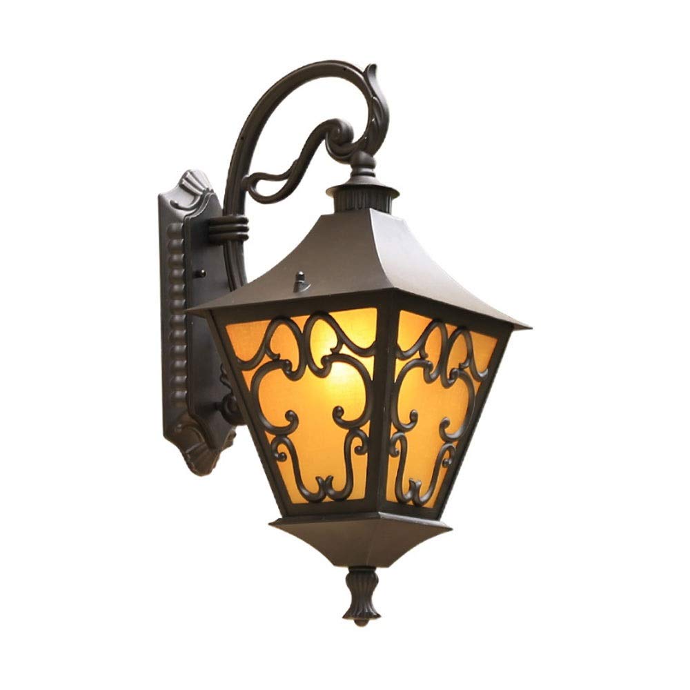 Luminaire de prestige en verre dépoli orange et fonte d'aluminium pour façade de villa
