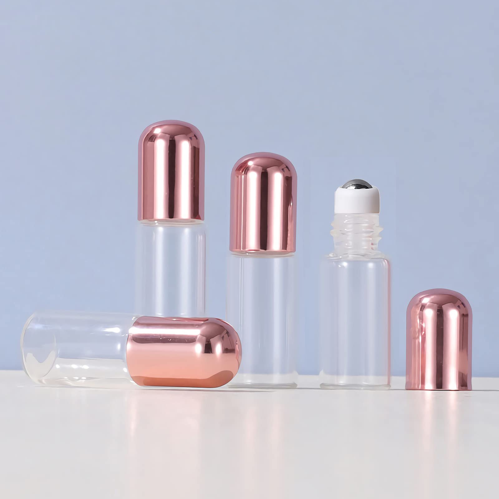 Sprühflasche aus Kunststoff, 50er-Pack, nachfüllbar, 10 ml, transparentes Glas, Roll-on, ätherisches Öl, Roller, leerer Glasprobenbehälter mit rosa Kappe für flüssiges P
