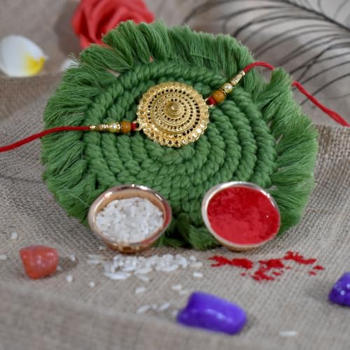 Image of DeoDap Rakhi for Brother with Chocolate - Round Shape Golden Color Rakhi with Almond Chocolate (32 GM) - Silver Color Pooja Coin, Greeting Card & Tilak Set - Tradtional Raksha Bandhan Combo