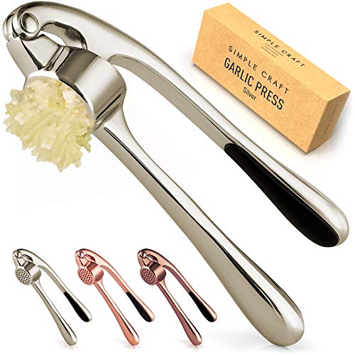 Simple Craft Garlic Press - Rustproof & Ergonomic Garlic Mincer That Is Easy To Squeeze - Heavy Duty Garlic Crusher For Extracting Garlic Paste, Nuts, Ginger, Seeds and More (Silver)