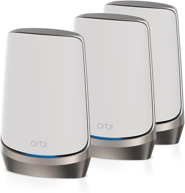 NETGEAR Orbi WiFi 6E Mesh System (RBKE963)  Quad-Band WiFi 6E Router with 2 Satellites | Coverage up to 7,500 sq. ft, 200 Devices | Ultra-Fast Speeds up to 10.8Gbps (AXE11000) | Simple Set Up