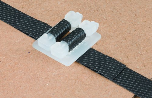 Evite roturas con el juego de flejado NIPS de 600 m y grapas 2