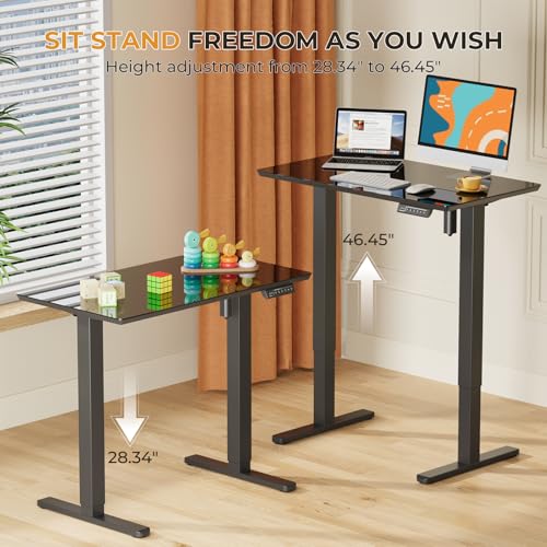Image of JOY worker Small Glass Standing Desk, 35 inch x 20 inch Electric Whole Piece Height Adjustable Desk with 4 Lockable Casters, Mobile White Sit to Stand Workstation for Home Office, Black