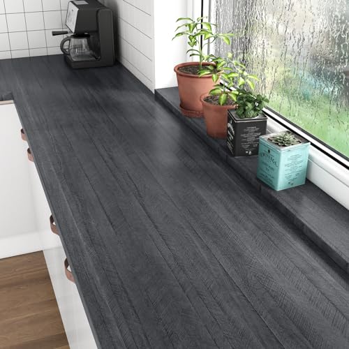 Papier peint à décoller et à coller imperméable pour rénover un comptoir abîmé sans travaux