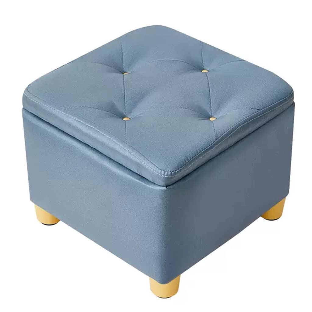 Repose-pieds bleu foncé pour ranger le désordre du salon et soulager vos jambes