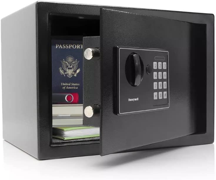 Honeywell safe interior with documents and passport