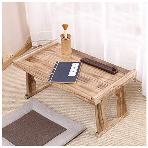 Table compacte avec pieds pliants pour optimiser les petits salons