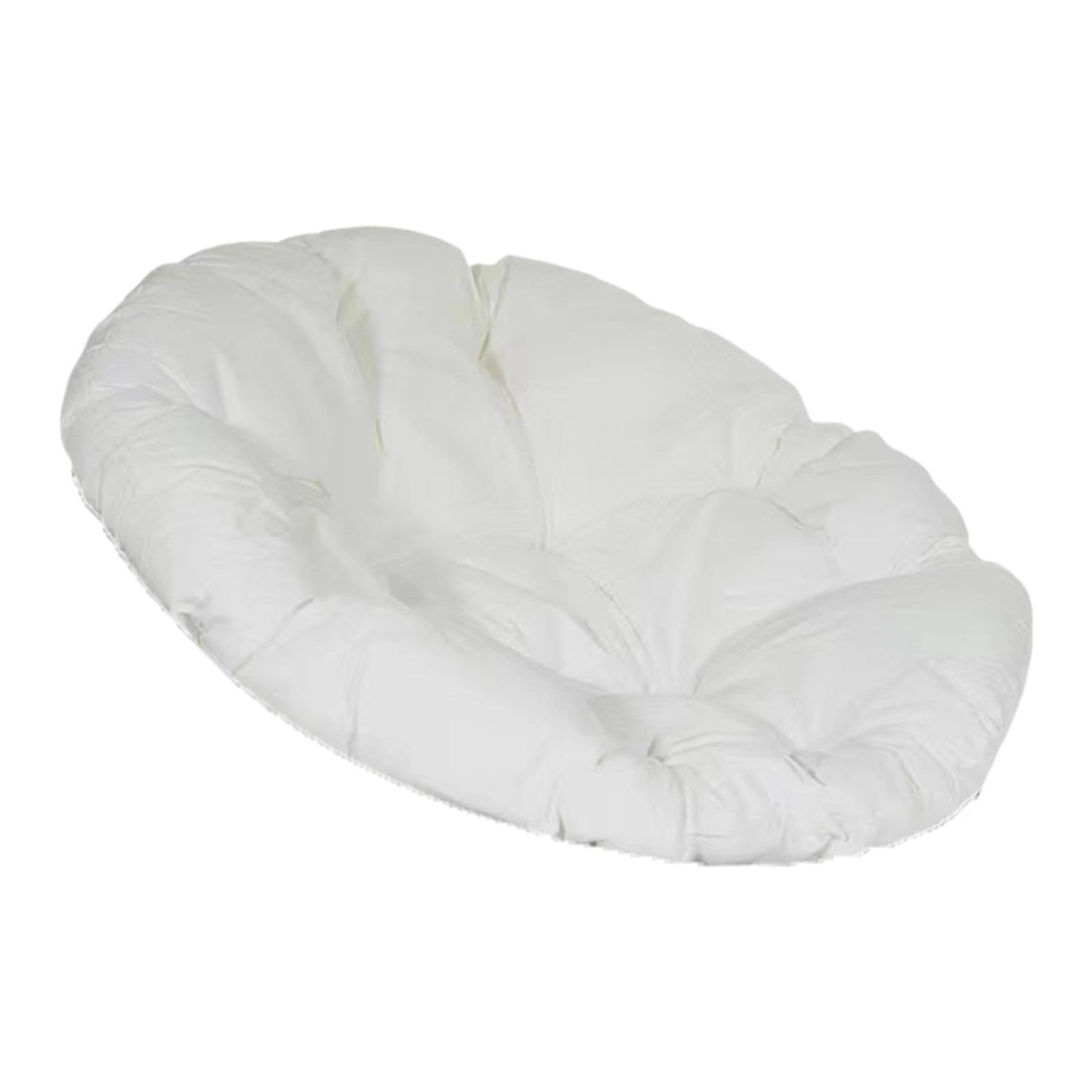 Coussin de sol ergonomique blanc pour soulager le dos sur fauteuil en rotin