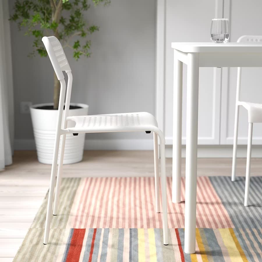 Ikea Steel Modern and Less Space Stacking Chair(White). 2