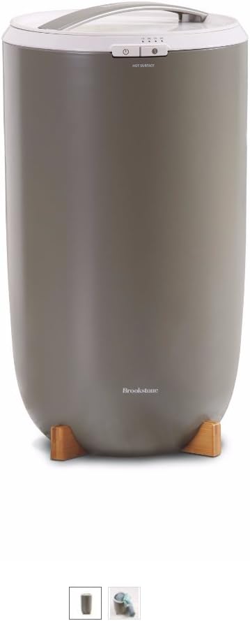 Brookstone Towel Warmer, front view, showing its cylindrical shape and control panel.