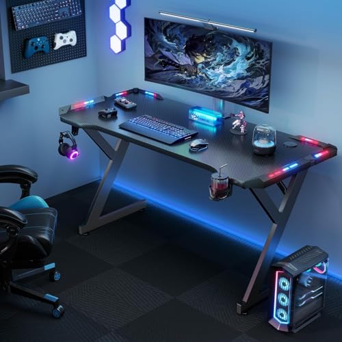 Image of HLDIRECT 47 Inch Gaming Desk with LED Lights, Ergonomic Computer Gaming Table with Carbon Fibre Surface, Sturdy PC Workstation Desk for Home Office with Headphone Hook, Cup Holder, Black