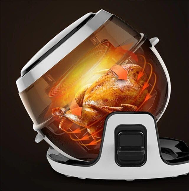 Air fryer oven tilted with a whole chicken cooking inside