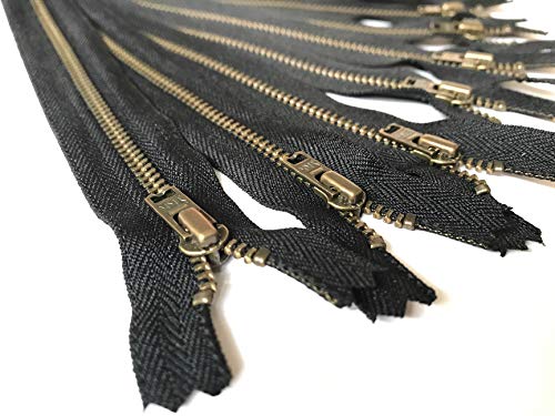 Fermetures éclair YKK en métal pour remplacer un zip cassé sur une veste d'hiver