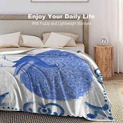 Couverture en flanelle antistatique motif paon chic pour canapé confortable