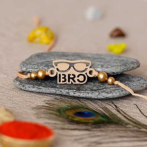 Image of eCraftIndia Golden Designer Bro Kids Rakhi with Roli Chawal Pack | Raksha Bandhan Rakhi
