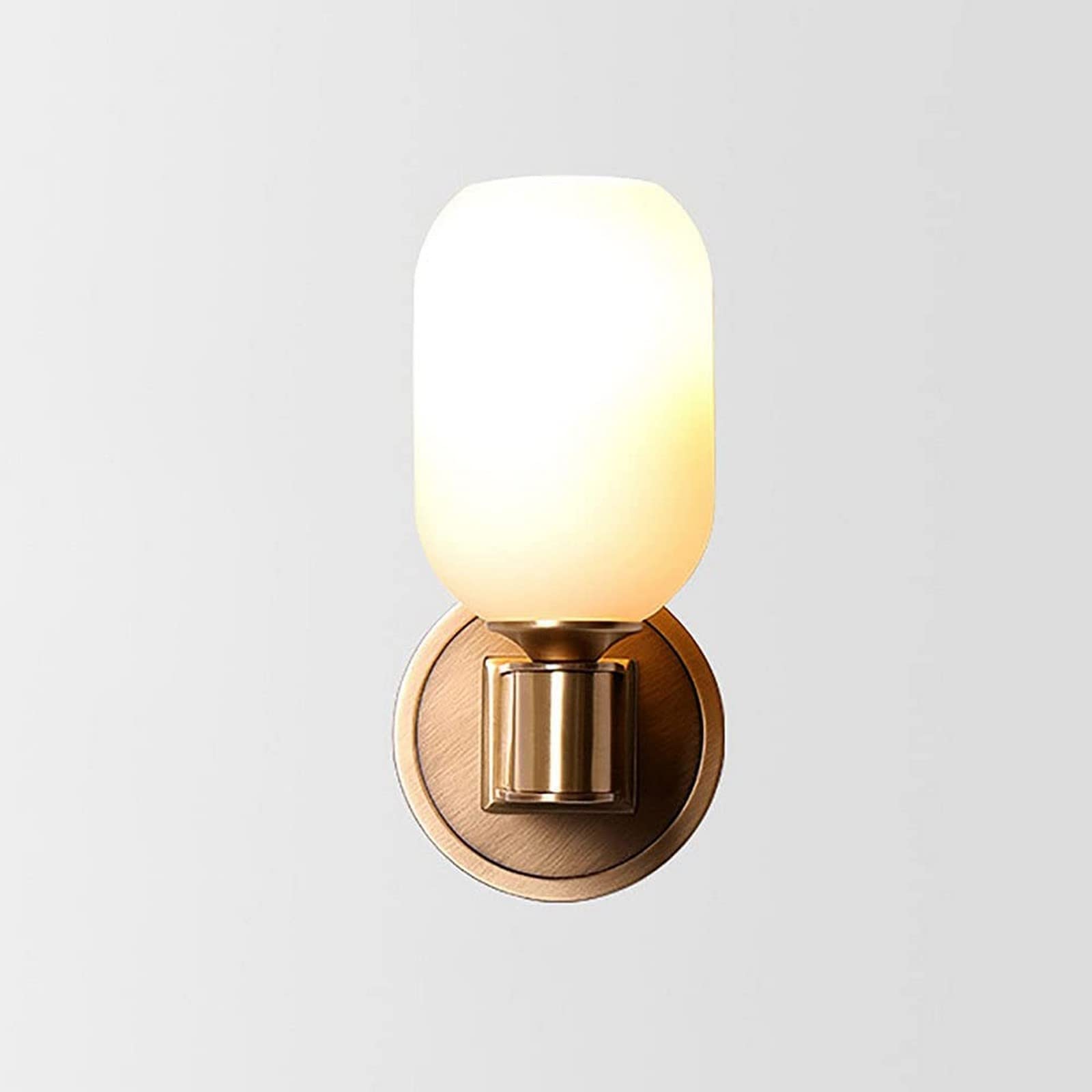 Lámpara de pared de cobre moderna para crear un ambiente relajante en el dormitorio