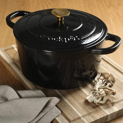 Image of Crock Pot Artisan 7-Quart Round Cast Iron Dutch Oven with Lid - Black Enamel Finish, Gold Knob, Durable Heavy-Duty Cookware for Slow Cooking, Baking, and Roasting