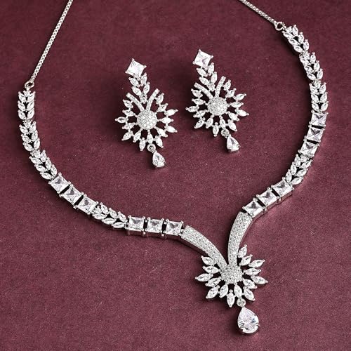 Image of ZENEME Rhodium Plated Brass Silver Toned Floral & Tear Drop Blue Crystal American Diamond Necklace With Earring Jewellery Set For Women
