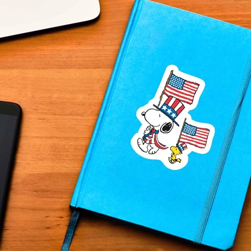 Image of Peanuts Snoopy Patriotic American Flag Adhesive Vinyl Decal - Fun Snoopy Parade Sticker for Car or Gear