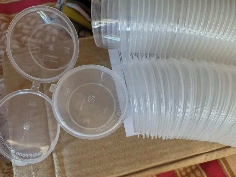 Image of Catloom | Pack of 50 | - 50ml Mini Container with Attached Lids | Reusable Food Container | Transparent Small Disposable Containers for Food, Sauce, Chutney, Samples (Transparent +Attached Lids)