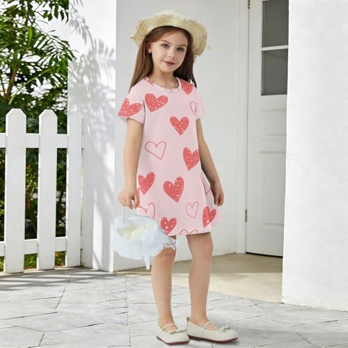 Vestido de niña rosa con falsas lentejuelas: el look casual ideal para el verano 6