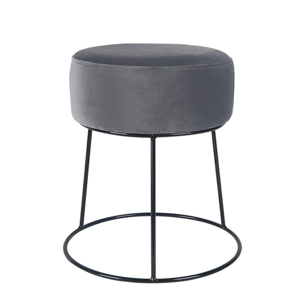 Banc de salon élégant pour créer un coin détente chaleureux près du canapé