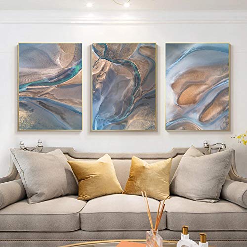 Toile abstrait doré bleu pour raviver un mur blanc vide sans encombrer l'espace