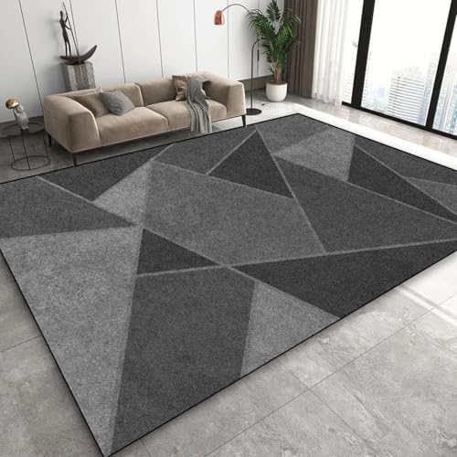 Tapis géométrique pour table basse et canapé créant un salon cocooning