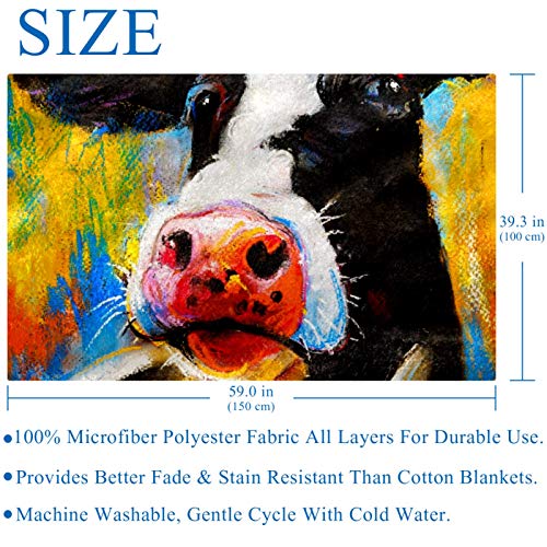 Couverture douce impression vache pastel pour des moments chauds en famille