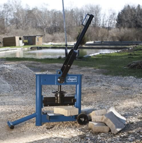 Scheppach HSC130 Stone Splitter in use, splitting a paving stone