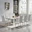 Silver Table With 8 White Chairs