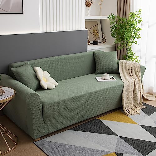 Housse de canapé rose extensible au design épuré et universel