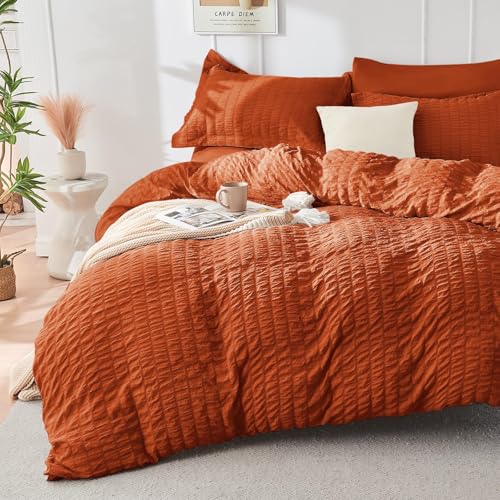 Image of HYMOKEGE Burnt Orange King Size Comforter Set Seersucker 7 Pieces, All Season Luxury Bed in a Bag for Bedroom, Bedding Set with Comforters, Sheets, Pillowcases & Shams