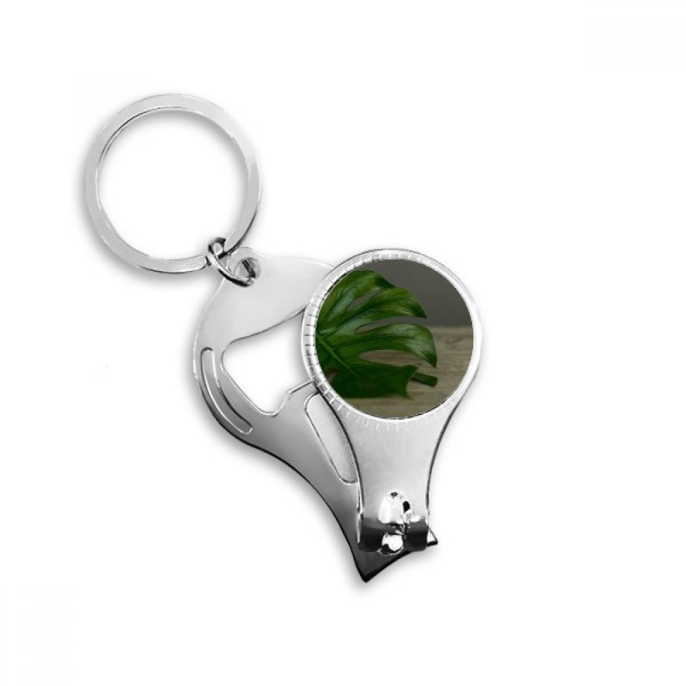 Porte-clés anneau nature avec coupe-ongles et ouvre-bouteille