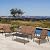 Grand patio 4 Pieces Outdoor Furniture Set, Leather-Look Patio Conversation Set, Vintage Brown Wicker Chairs Loveseat and A Coffee Table, Patio Furniture for Garden, Backyard, Porch