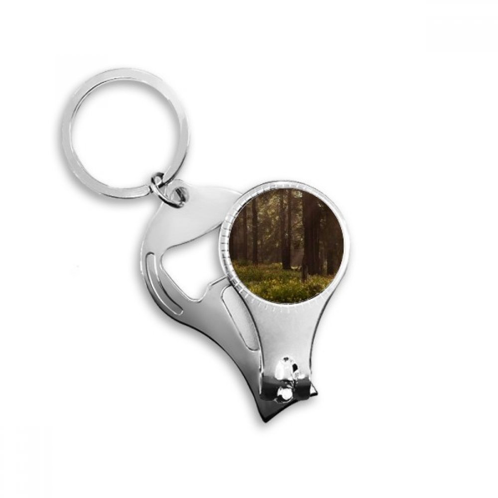 Porte-clés paysage forestier et coupe-ongles multifonction pour vos sorties en plein air