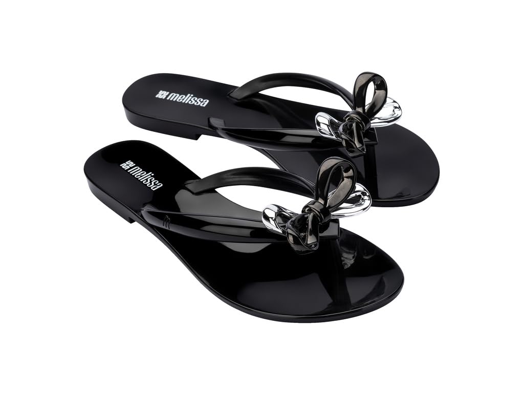 Melissa Harmonic Eclipse - Sandali da donna alla moda, eleganti infradito con fiocco metallico, in PVC leggero, design flessibile, sandali estivi da donna, piatti e flessibili